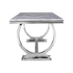 Table de salle à manger moderne avec piètement en U en acier inoxydable