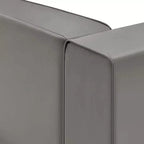Fauteuil d'angle droit en cuir vegan avec design aéré pour salon